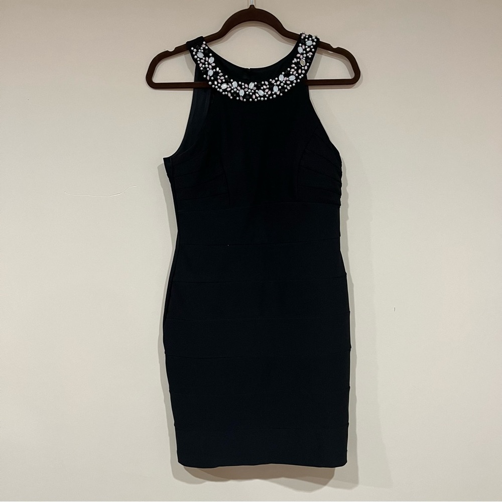 black bodycon dress with jeweled neckline